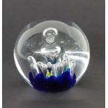 A PAPERWEIGHT Colourless glass with fusion. 10 cm highPAPERWEIGHTFarbloses Glas mit Einschmelzungen.