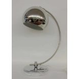 A DESIGNER ARC LAMP 1960s/ 1970s Chromed metal frame. 70 cm high.DESIGNER BOGENLAMPE1960er/70er