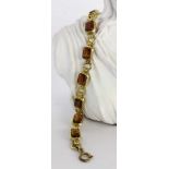 A BRACELET Gilt silver with Madeira citrines. 18 cm long.ARMBANDSilber vergoldet mit