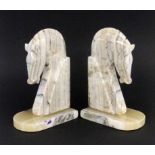 A PAIR OF ART DECO BOOKENDS Stylised marble horse busts. 23 cm highPAAR ART DECO