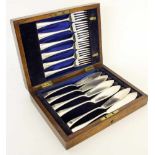 SET OF FISH KNIVES AND FORKS Silver-plated. Complete for 6 people, in cutlery