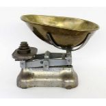 OLD MARKET SCALES England circa 1900 Cast iron and brass, with 4 English weights.Approximately 35 cm