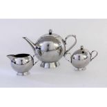 A NICK MUNRO DESIGNER SERVICE High polished stainless steel. 3 pieces, consisting of teapot, sugar