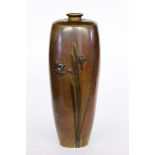 A VASE Japan. Meiji period Bronze with lily decoration in relief. Seal mark: Inoue. 22.5cm high.