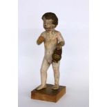 THE JESUS CHILD WITH A BASKET OF GRAPES probably Italy, 17th/18th century Carved wood andremnants of
