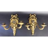 A PAIR OF SCONCES France, 19th century Two-light, baroque form. Gold-plated bronze withburnished