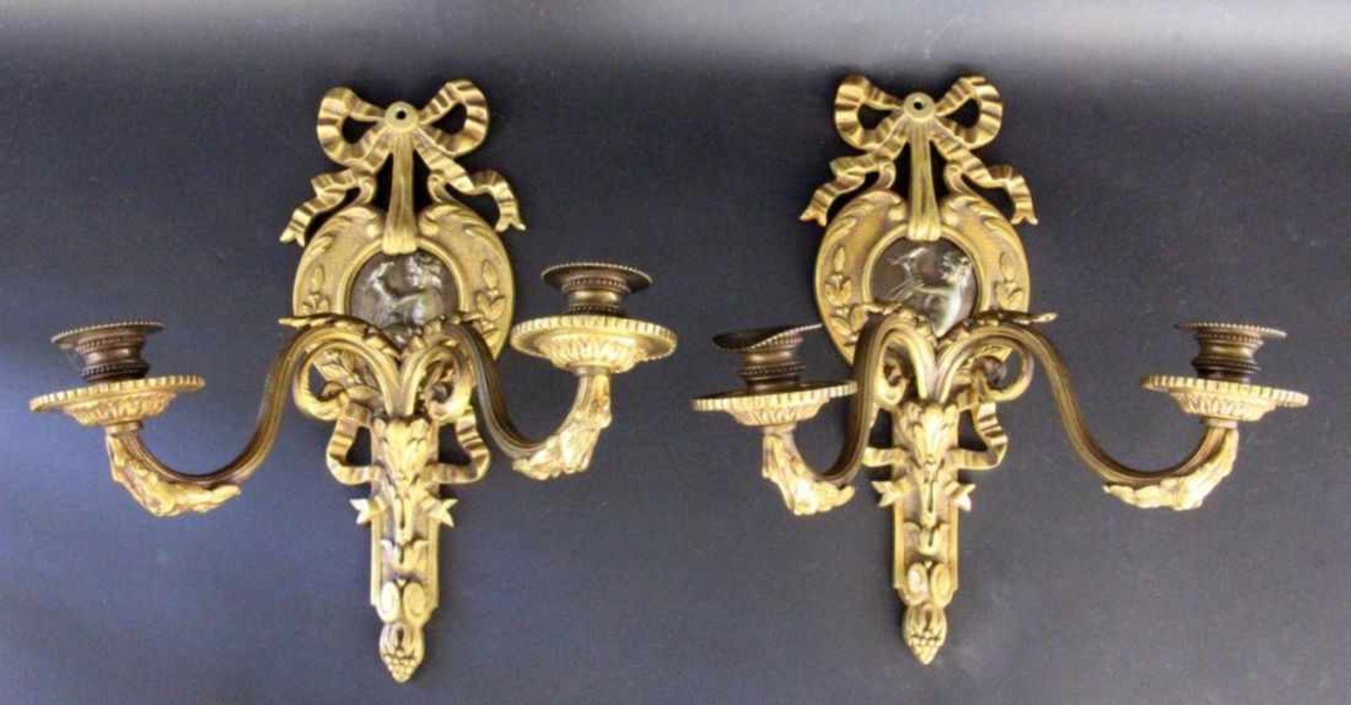 A PAIR OF SCONCES France, 19th century Two-light, baroque form. Gold-plated bronze withburnished