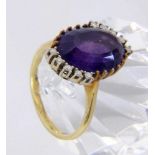 A LADIES RING 585/000 yellow gold with amethyst and brilliant cut diamonds. Ring size 56,gross