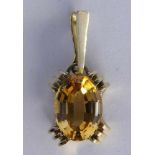 A PENDANT 585/000 yellow gold with citrine. 3.8 cm long, gross weight approximately 9.