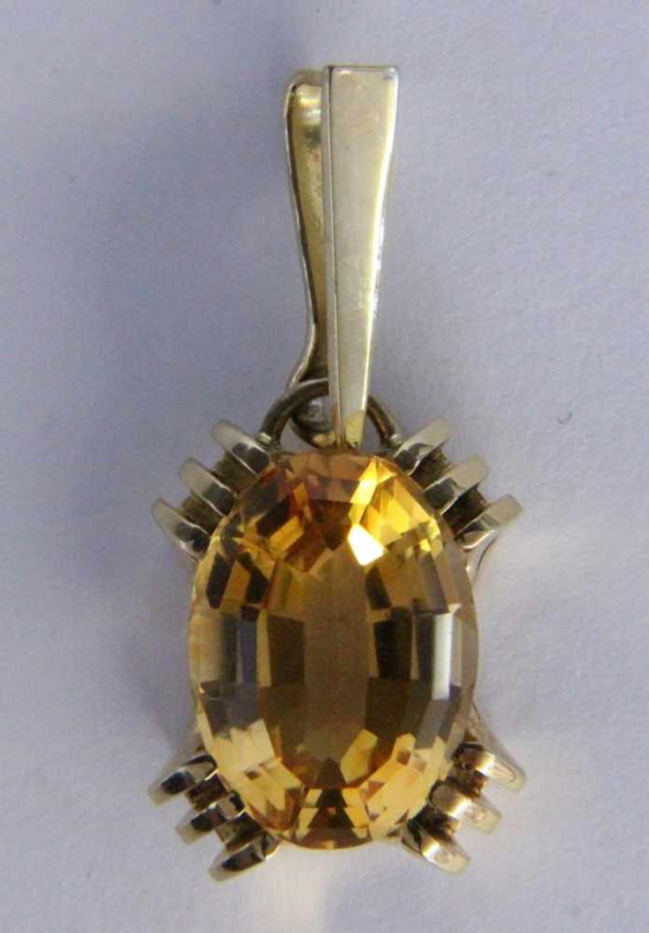 A PENDANT 585/000 yellow gold with citrine. 3.8 cm long, gross weight approximately 9.