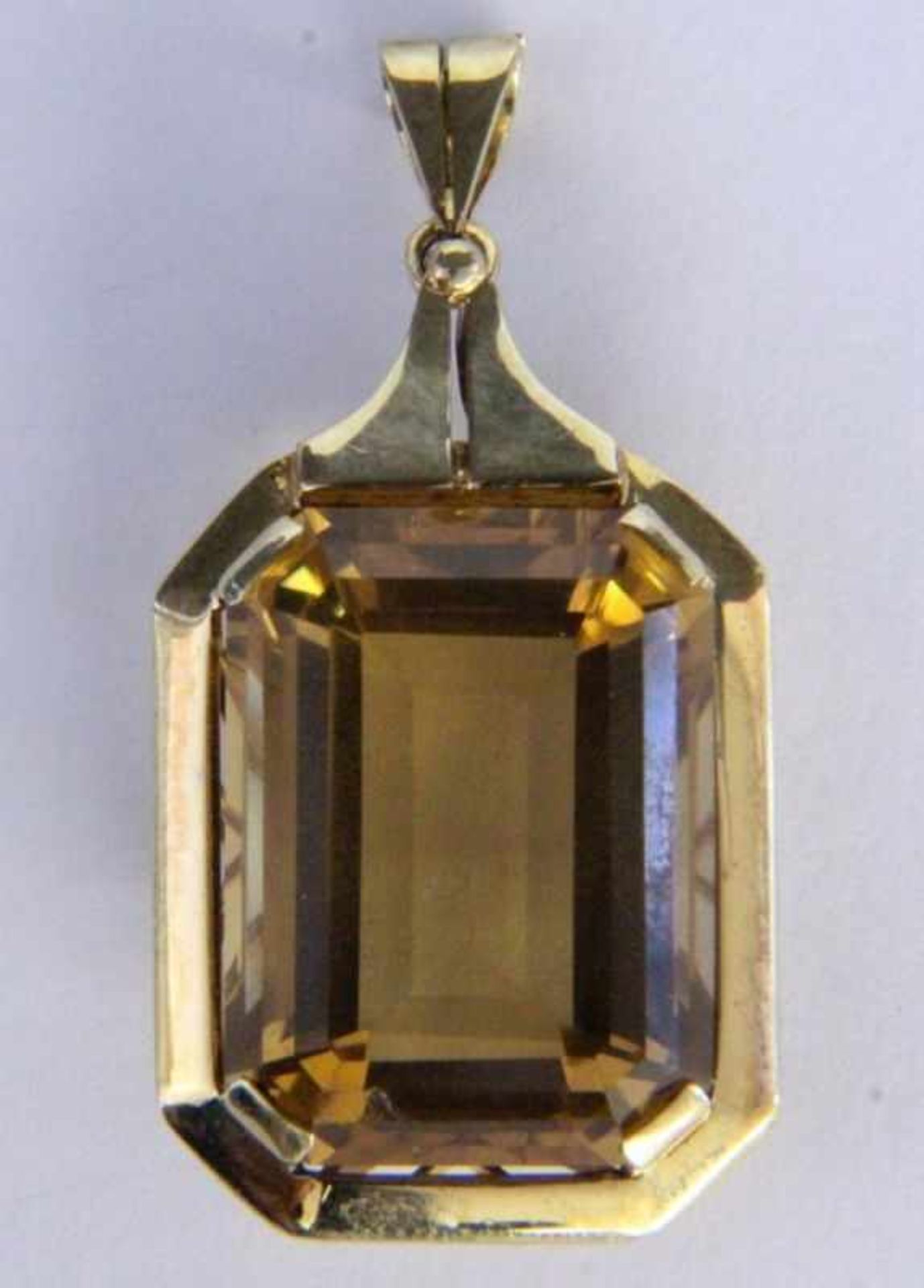 A PENDANT 585/000 yellow gold with large citrine. 4.5 cm long, gross weight approximately14