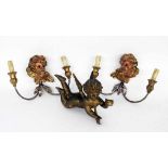 A PAIR OF DECORATIVE SCONCES with angel heads. Wood and metal. Approximately 25 x 35 cm.Includes a