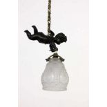 A SMALL HANGING LAMP WITH CHERUB France 1920s Frosted glass shade with relief decoration,held by a