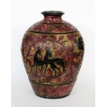 A DECORATIVE VASE Glazed ceramic with surrounding relief decoration with animals andplants. 27 cm