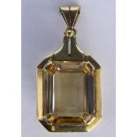 A PENDANT 585/000 yellow gold with citrine. 4 cm long, gross weight approximately 10.