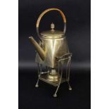AN ART NOUVEAU TEA POT WITH WARMER AND RECHAUD circa 1910 Brass. Handle with wrapped roundwood