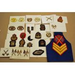 Trade and Rank Badges, a good selection of trade and rank badges some metal and some bullion,