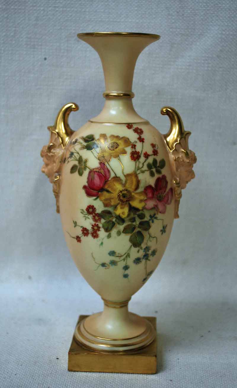 A Royal Worcester blush ivory bone china Vase, ovoid form with a pair of satyr mask handles, circa