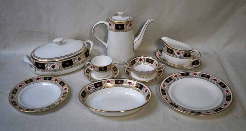 A Royal Crown Derby bone china Dinner Service for eight places, extends to seventy pieces in the