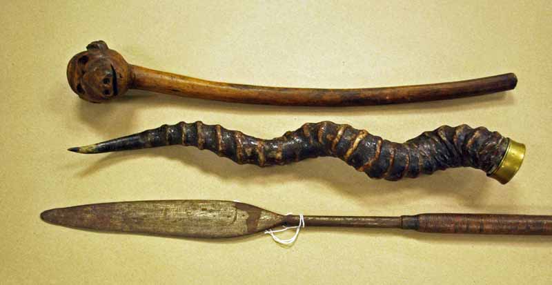 A Zulu Spear and Monkey Head Knobkerri, late 19th C Zulu spear with a strong leaf shaped hand forged