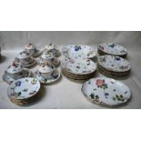 A Herend porcelain thirty-eight piece Dinner Service, decorated with fruit and flowers, consisting