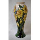 A modern Moorcroft Pottery limited edition Vase of tall baluster form, 75/10 shape, tubeline