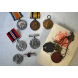 Father and Son group of Medals WW1 Territorial Overseas Service Medal and pair all inscribed 606