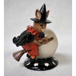 A Royal Doulton DB162 Bunnykins Figure, Trick or Treat as a Witch on a Broomstick with Cat against a