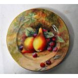 A Royal Worcester hand painted Cabinet Plate, decorated with fruit against a naturalistic ground,