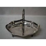 An early 20th century silver Bread Basket, shaped oval form, pierced sides with swing handle on four