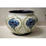 A late 19th/early 20th century Moorcroft Macintyre Jardiniere of typical compressed circular form