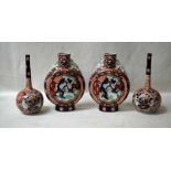 A pair of Japanese Imari Moonflasks of typical form with Dragon handles, 25cm high and a pair of