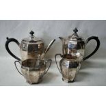 A George V silver four-piece Coffee Service of curved octagonal form, consisting of a coffee pot and