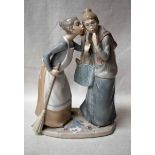 A large Lladro Figural Group as two women gossiping, 30cm high