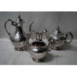 A Victorian silver four-piece Tea Service, William/Samuel Smiley, London 1865, each piece embossed