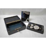 A Victorian Ladies Travelling Vanity Case, leather bound, rectangular with hinged lid, folding brass