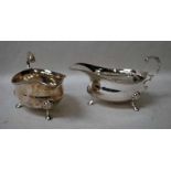 A pair of Scottish Silver Sauce Boats, of typical form, three feet, C scroll handle, gadrooned rim