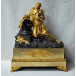 An imposing French Empire style sculptural Mantel Clock, cast bronze and mercury gilded featuring