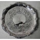 A mid to late 18th century Irish Silver waiter, shaped circular form with gadrooned and acanthus