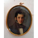 A late 19th century Memorial Portrait Miniature, depicting Theodor Goldstuker, in a yellow metal