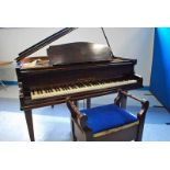 A 20th century Baby Grand Piano by Mornington and Weston, number 52851, on Tuplex cast iron frame,