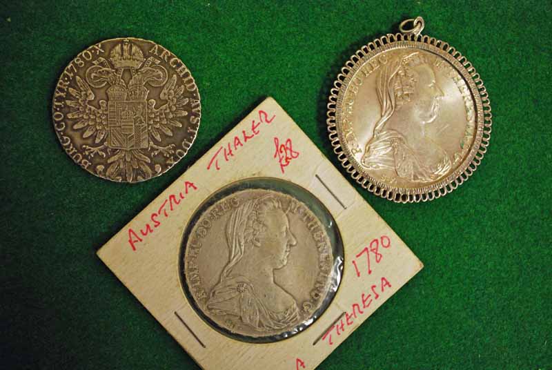Maria Theresa, Austrian, three silver Thaler Coins dated 1780, one in white metal pendant mount