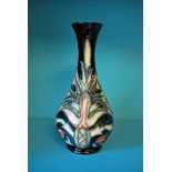 A late 20th century Moorcroft Pottery Vase, tubeline decoration in the William Morris Snake Head