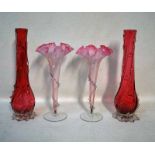Two pairs of early 20th century Cranberry Glass Vases, one pair of slender long neck bulbous form