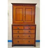 A handsome Georgian oak and mahogany Cabinet over Chest, the upper portion with moulded cornice over