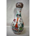 A 19th century Chinese, Famille Verte Bottle Vase, white porcelain glazed ground decorated in