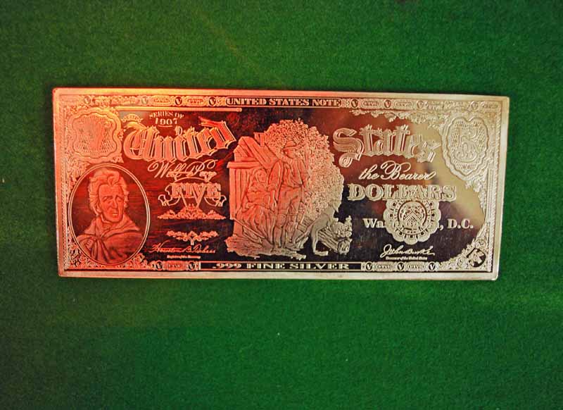 A USA Replica Five Dollars Bill cast in 0.999 fine silver, inscribed Series of 1907, 375g, 15.5cm by