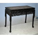 A late 19th/early 20th century Chinese hardwood Altar Table, rectangular top inset with pink/brown