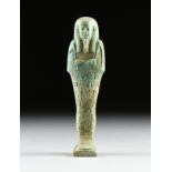 AN ANCIENT EGYPTIAN STYLE FAIENCE USHABTI, LATE PERIOD, 26TH DYNASTY, 664-525 BC, the green and blue