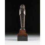 AN ANCIENT EGYPTIAN MUMMIFORM SERPENTINE ROYAL OFFERING USHABTI, ATTRIBUTED TO THE MIDDLE KINGDOM (